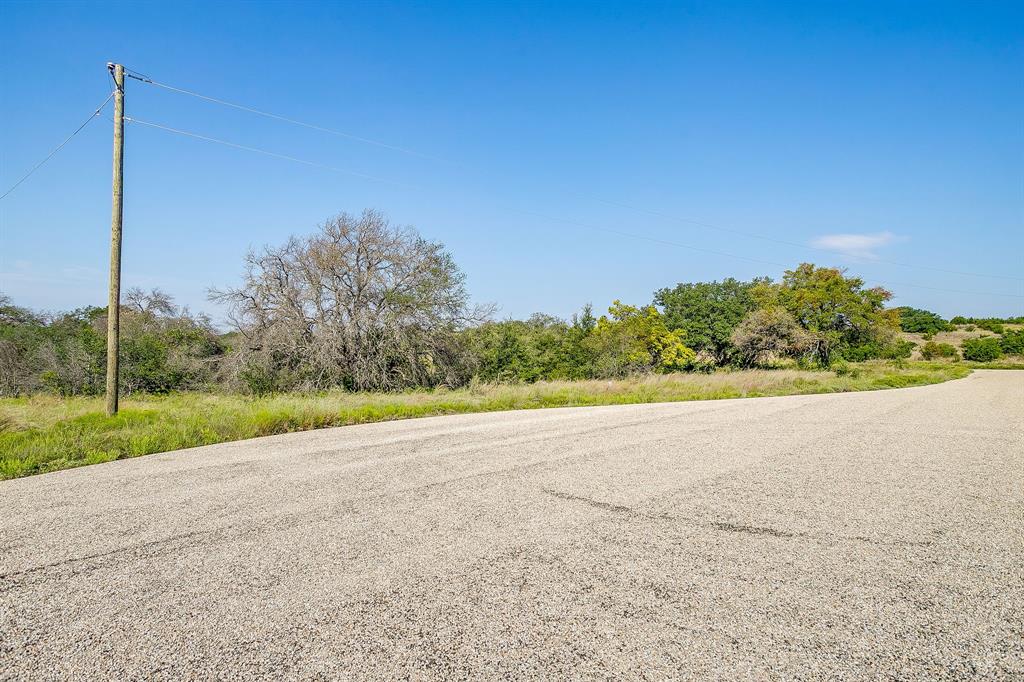 1034 Hidden View Glen Rose, TX 76043 - Photo 14 of 15 a view of a field with a yard