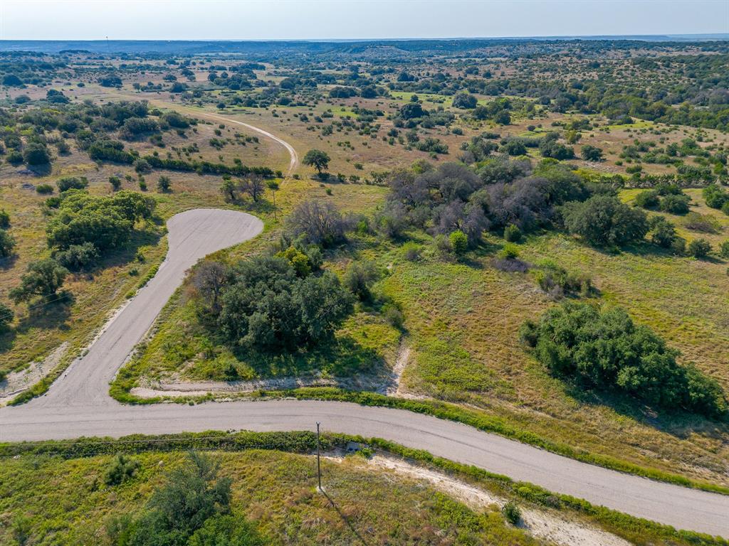 1034 Hidden View Glen Rose, TX 76043 - Photo 2 of 15 an aerial view of residential houses with outdoor space