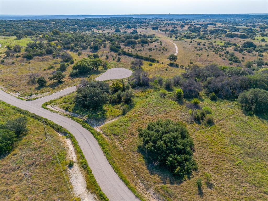 1034 Hidden View Glen Rose, TX 76043 - Photo 3 of 15 a view of a lake with mountains in the background