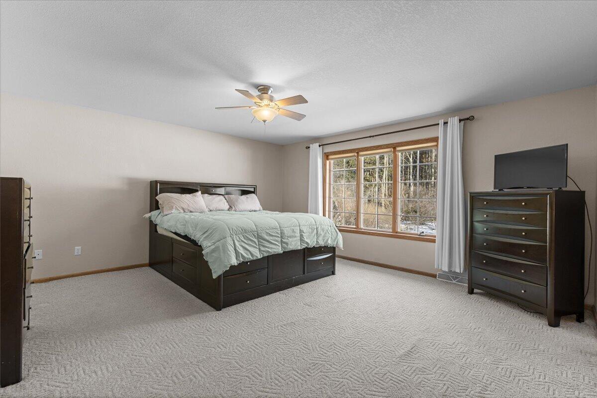 612 Bobolink Lane Cascade, WI 53011 - Photo 16 of 65 Primary Bedroom