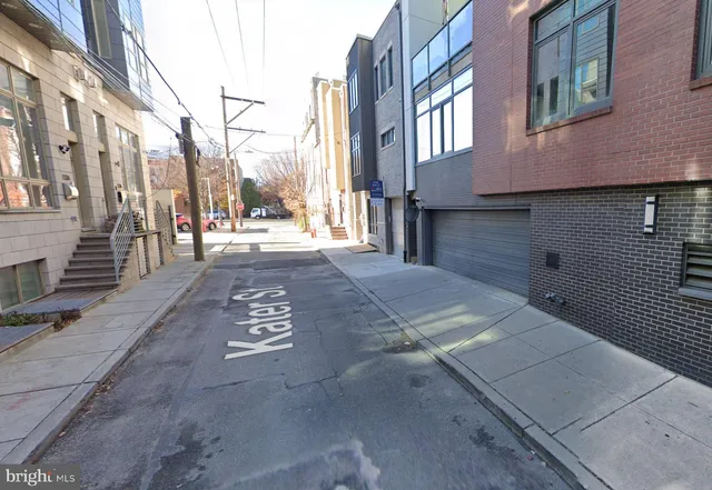 a view of a street with buildings