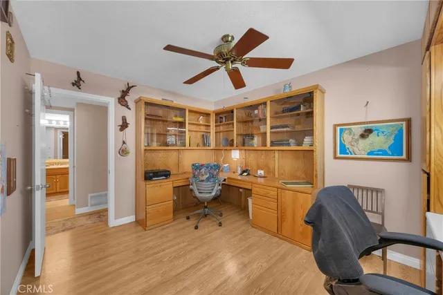 an aerial view of residential houses with city view