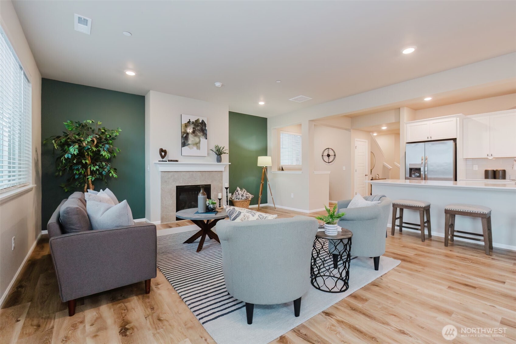 916 Baker Heights Loop Bremerton, WA 98312 - Photo 16 of 40 a living room with furniture and a fireplace