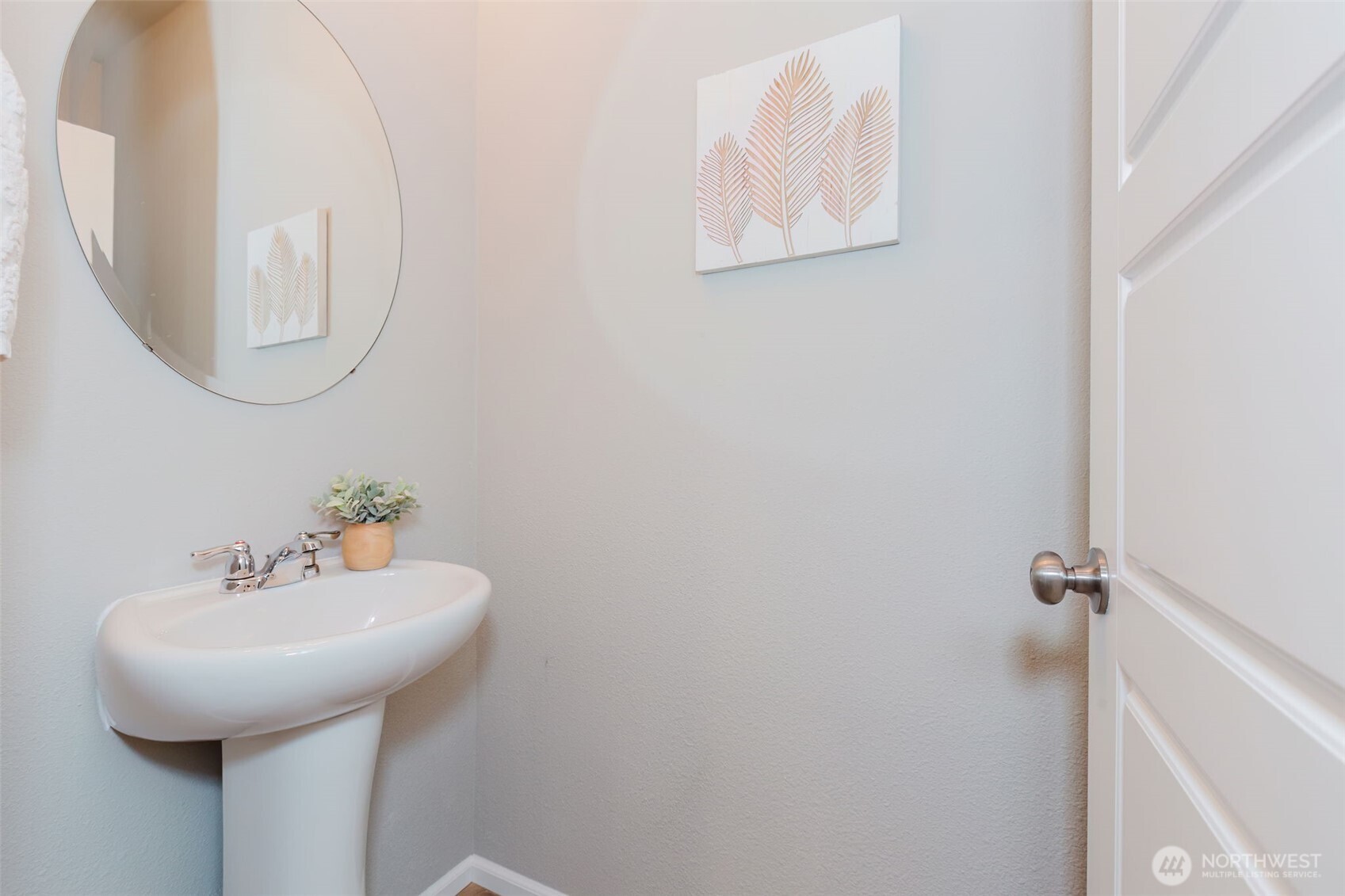 916 Baker Heights Loop Bremerton, WA 98312 - Photo 19 of 40 a bathroom with a sink and a mirror