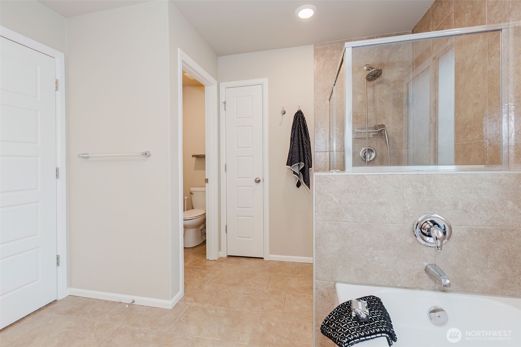 916 Baker Heights Loop Bremerton, WA 98312 - Photo 25 of 40 a bathroom with a bathtub and a shower