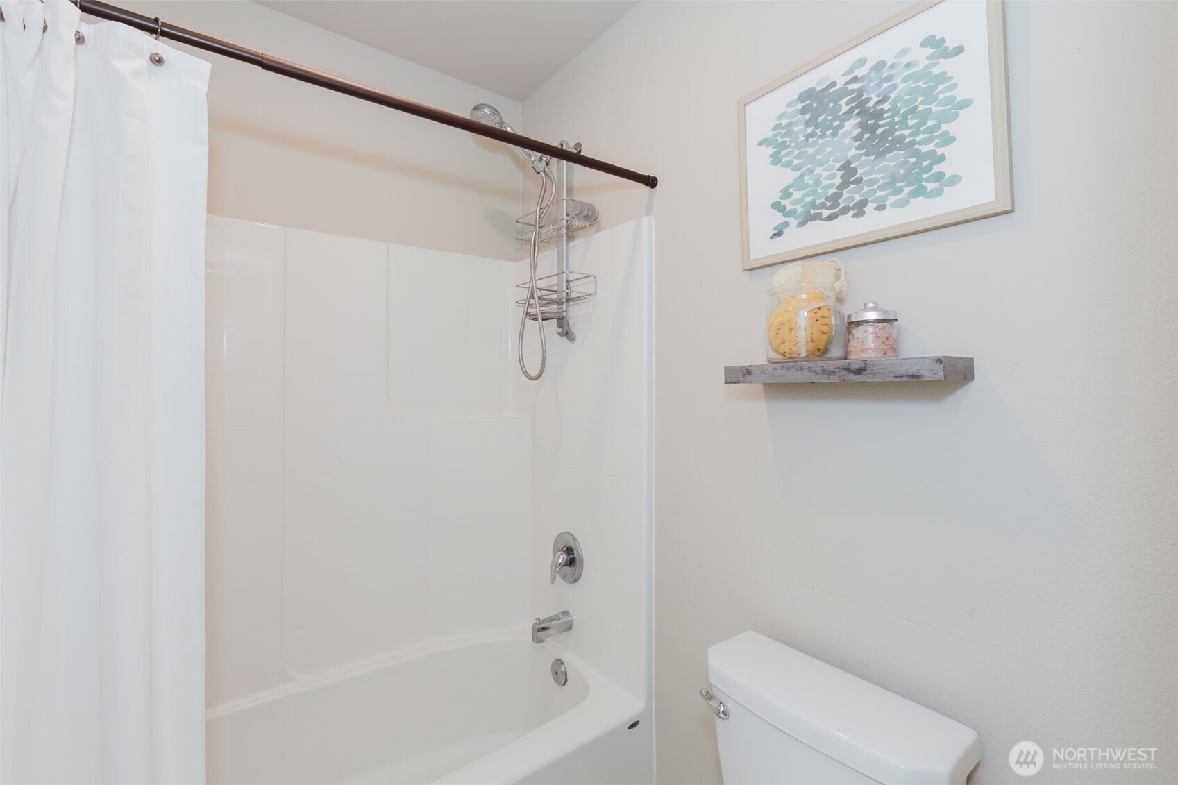 916 Baker Heights Loop Bremerton, WA 98312 - Photo 31 of 40 a bathroom with a shower and a toilet