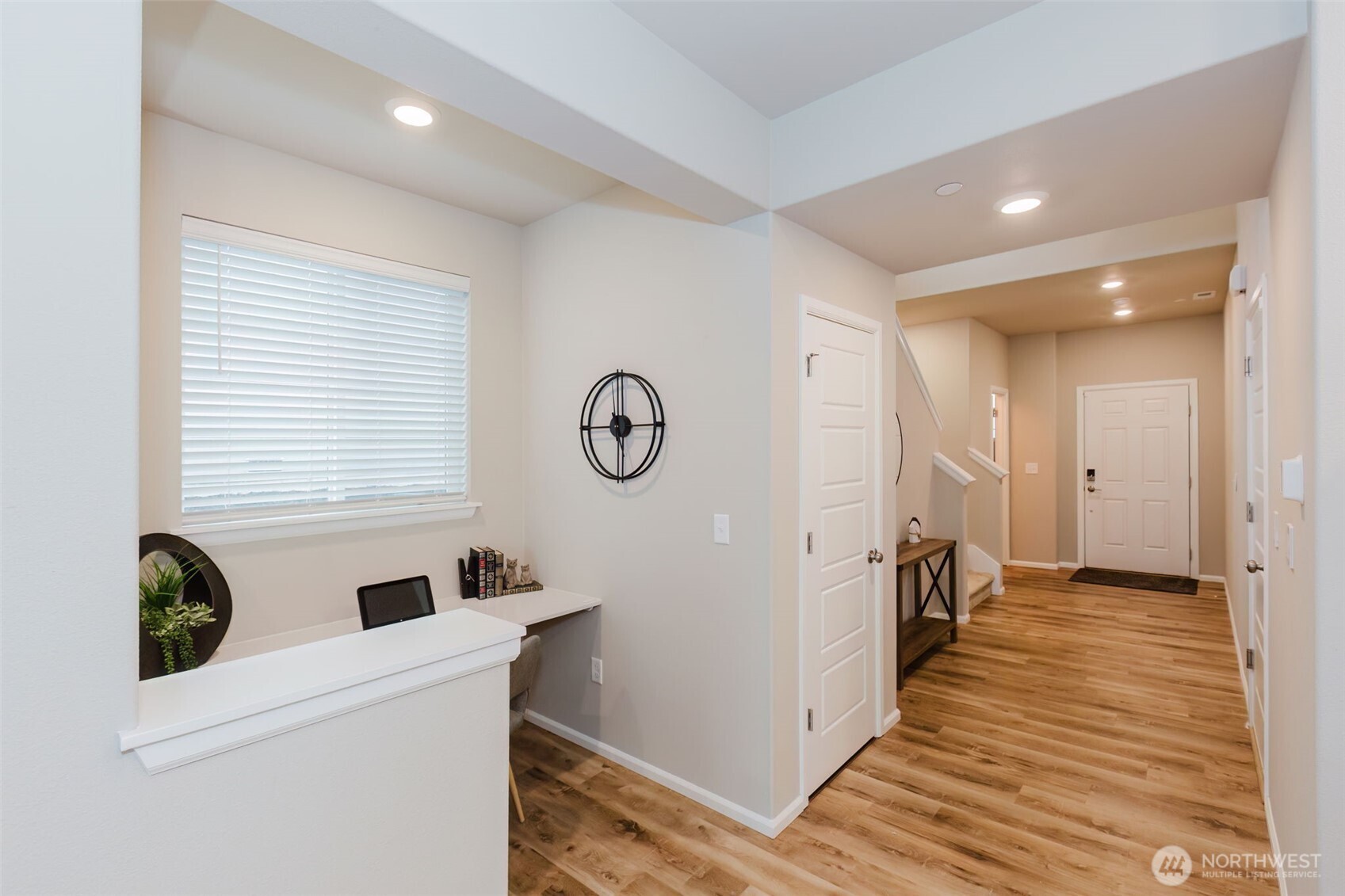 916 Baker Heights Loop Bremerton, WA 98312 - Photo 4 of 40 a view of hallway with wooden floor