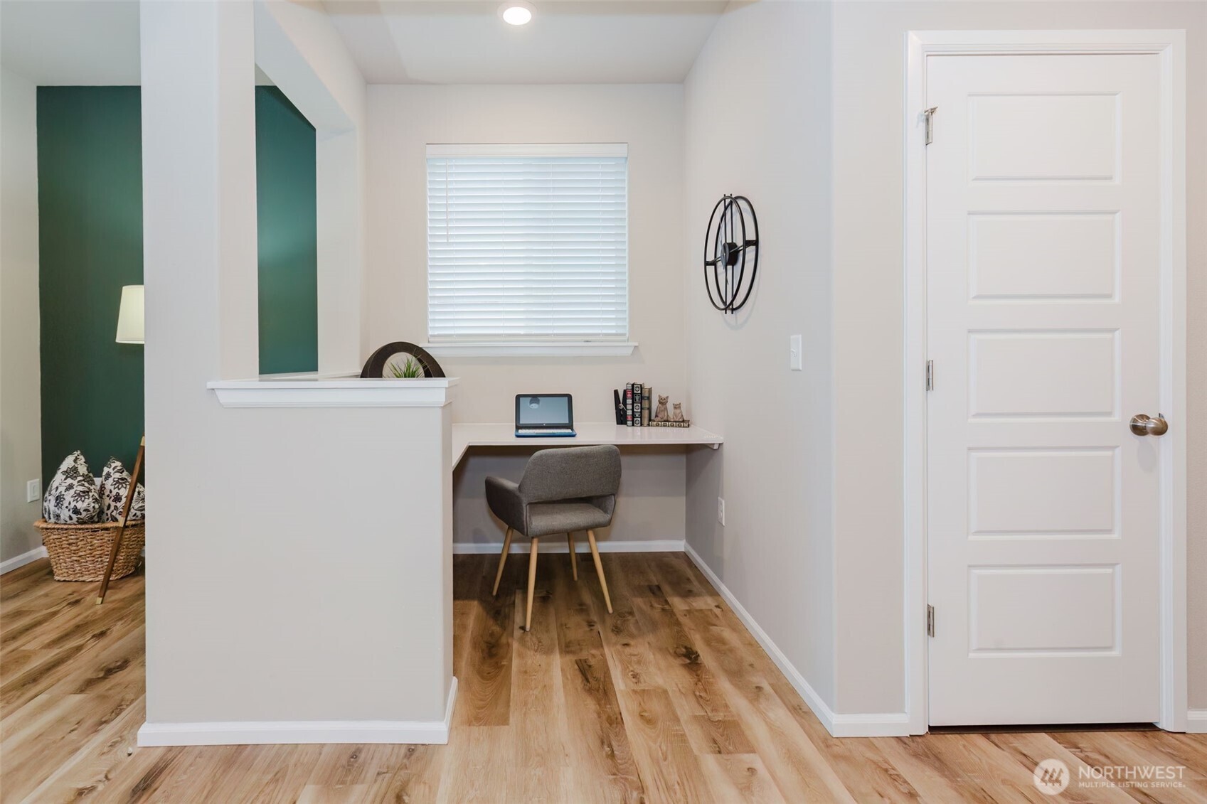 916 Baker Heights Loop Bremerton, WA 98312 - Photo 5 of 40 a view of dining room with wooden floor and white cabinet