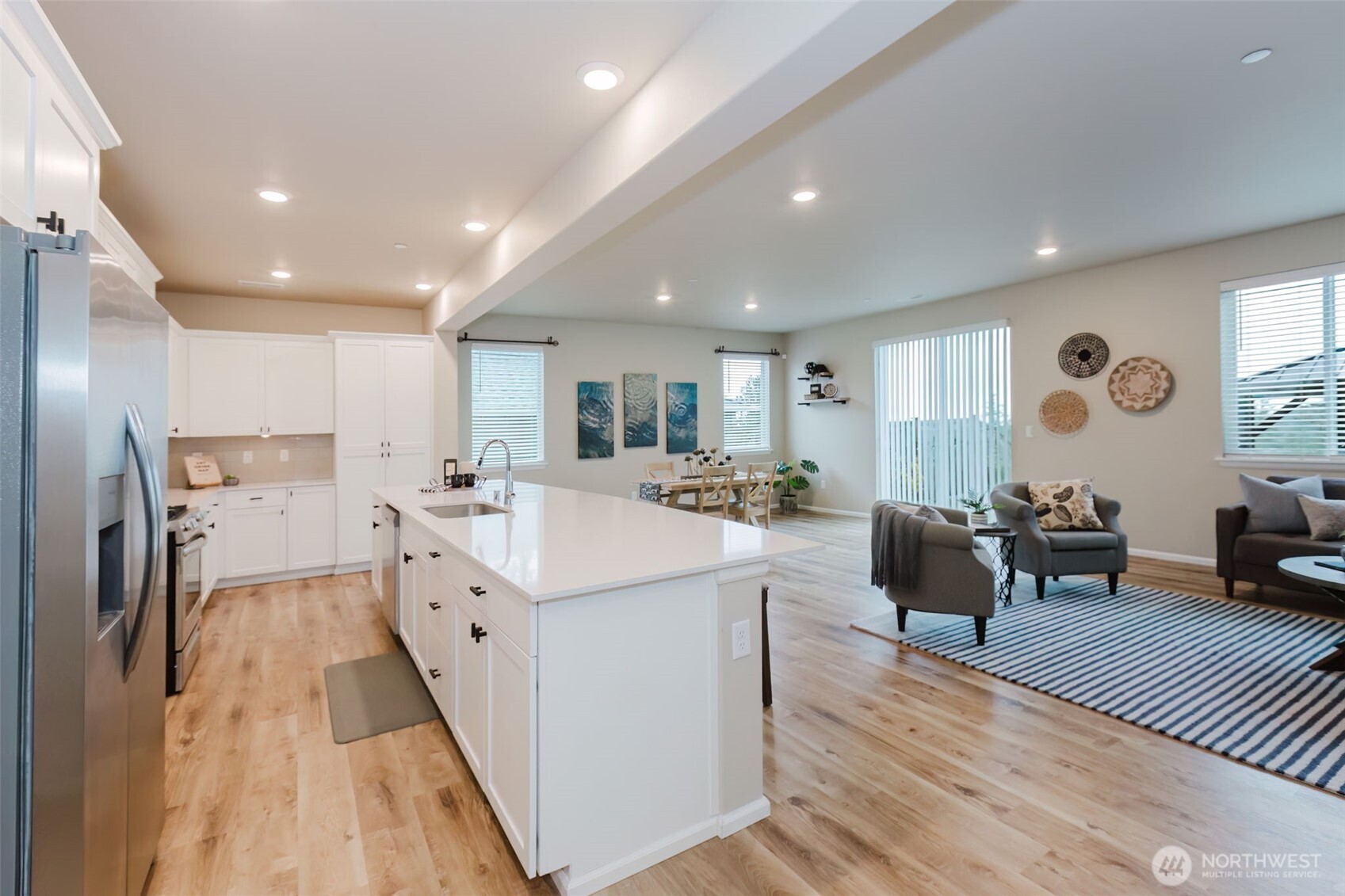 916 Baker Heights Loop Bremerton, WA 98312 - Photo 7 of 40 a living room with furniture and a wooden floor