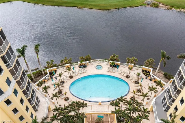 a view of a chairs and table in the balcony