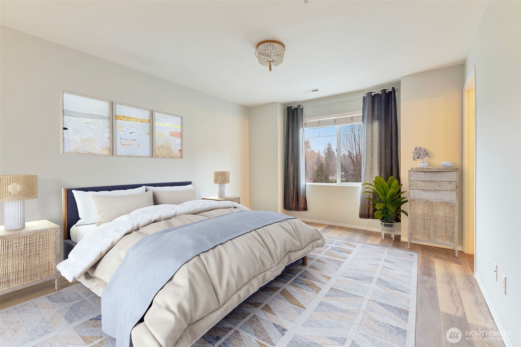 5319 147th St Court East, Unit 5 Tacoma, WA 98446 - Photo 23 of 30 a bedroom with a large bed and a large window