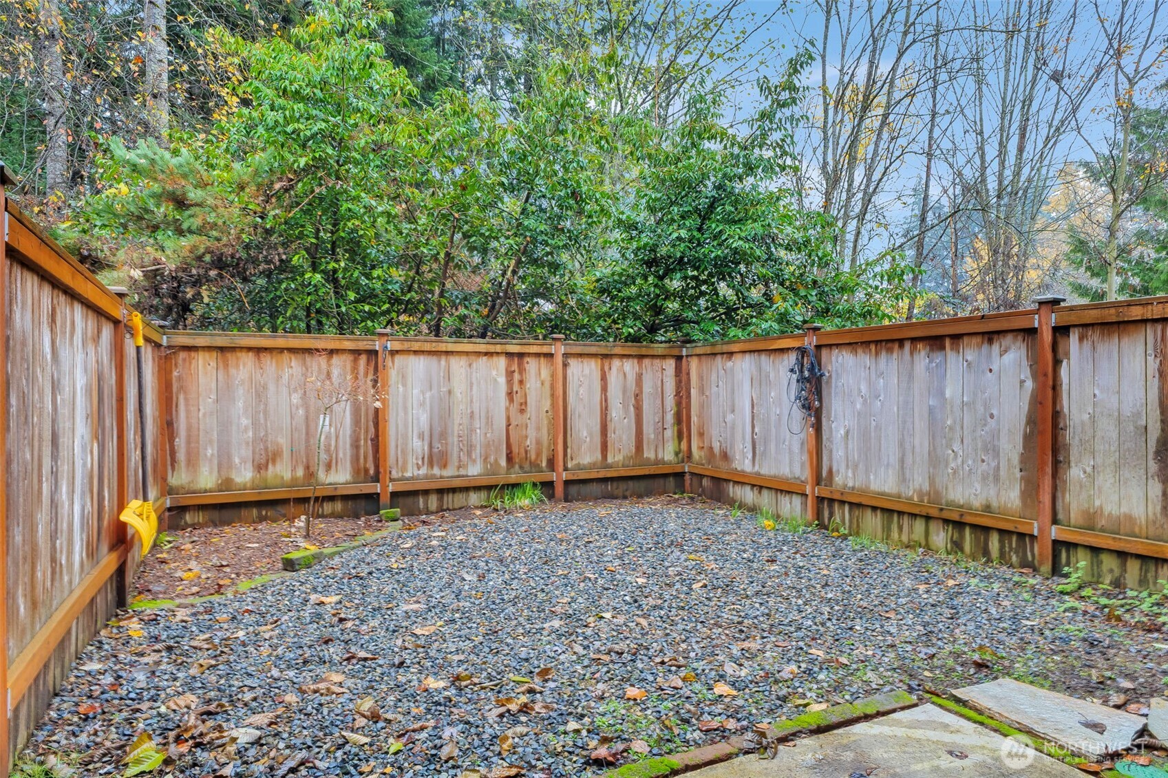 5319 147th St Court East, Unit 5 Tacoma, WA 98446 - Photo 29 of 30 a backyard of a house