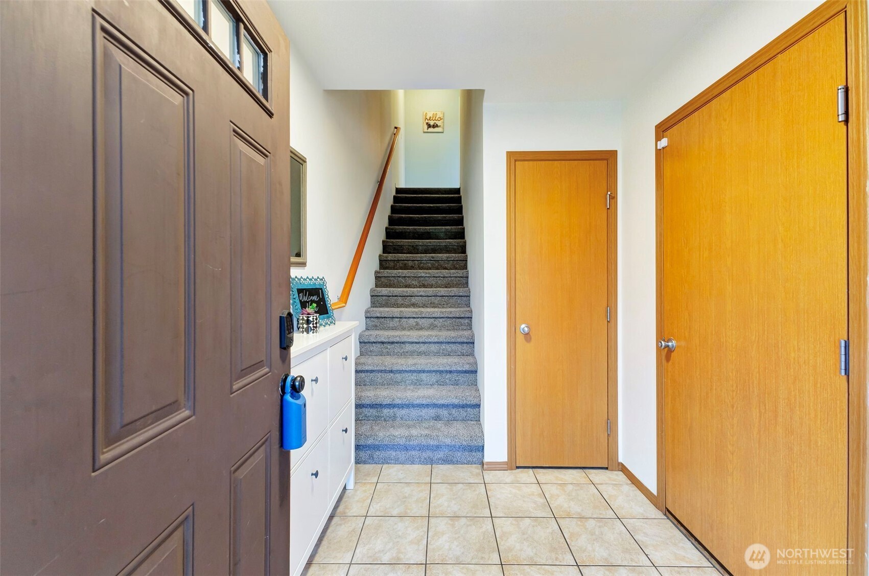 5319 147th St Court East, Unit 5 Tacoma, WA 98446 - Photo 4 of 30 a view of entryway with wooden floor and stairs