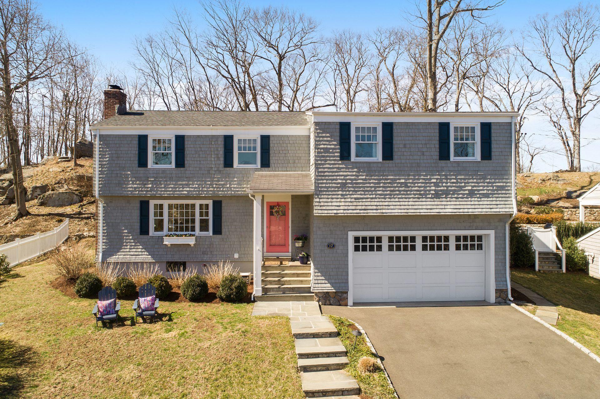 17 Steeple Top Road Rowayton, CT 06853 - Photo 1 of 37 a view of a house with a patio