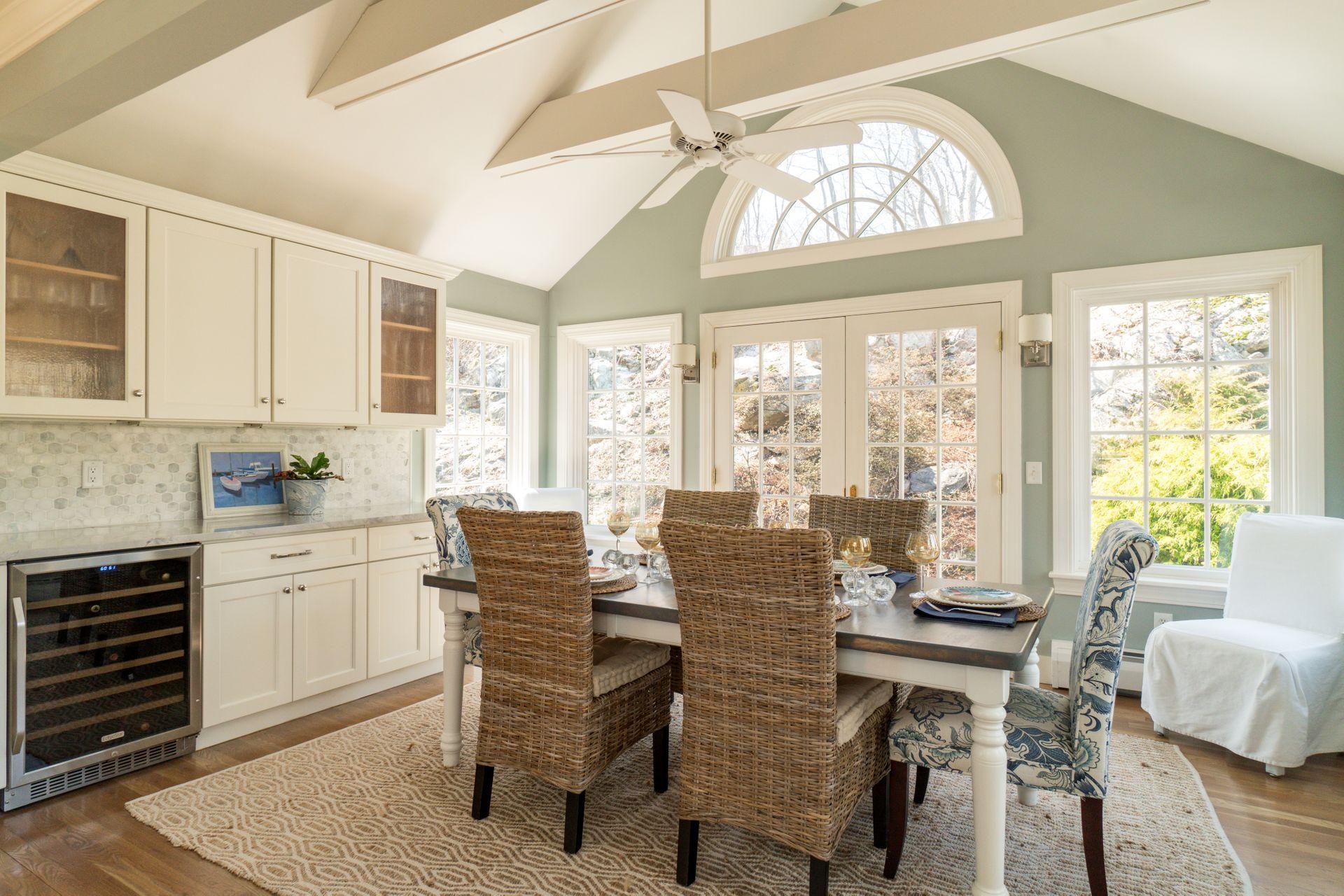 17 Steeple Top Road Rowayton, CT 06853 - Photo 13 of 37 a dining room with furniture a chandelier and wooden floor