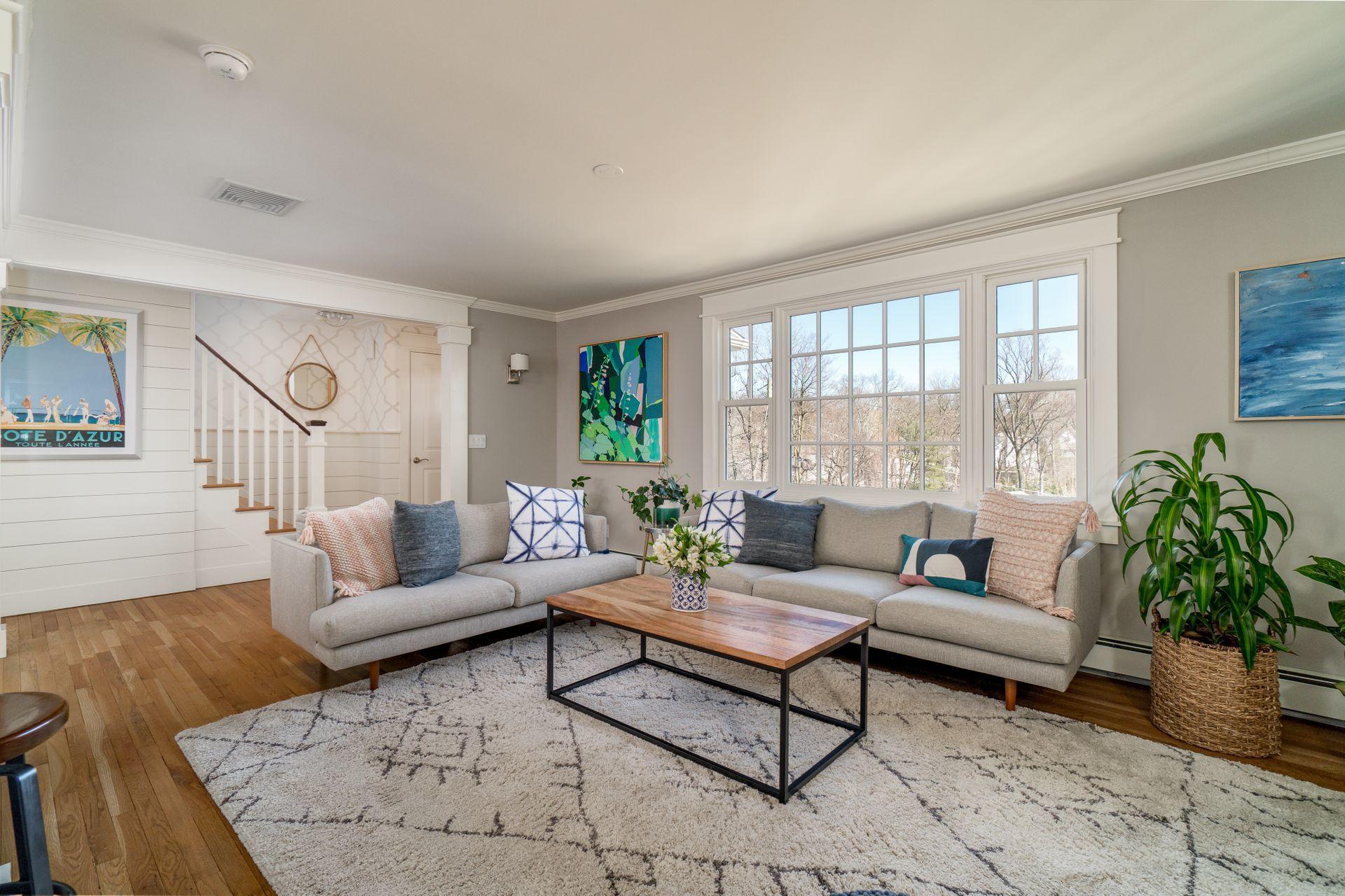 17 Steeple Top Road Rowayton, CT 06853 - Photo 8 of 37 a living room with furniture and a large window