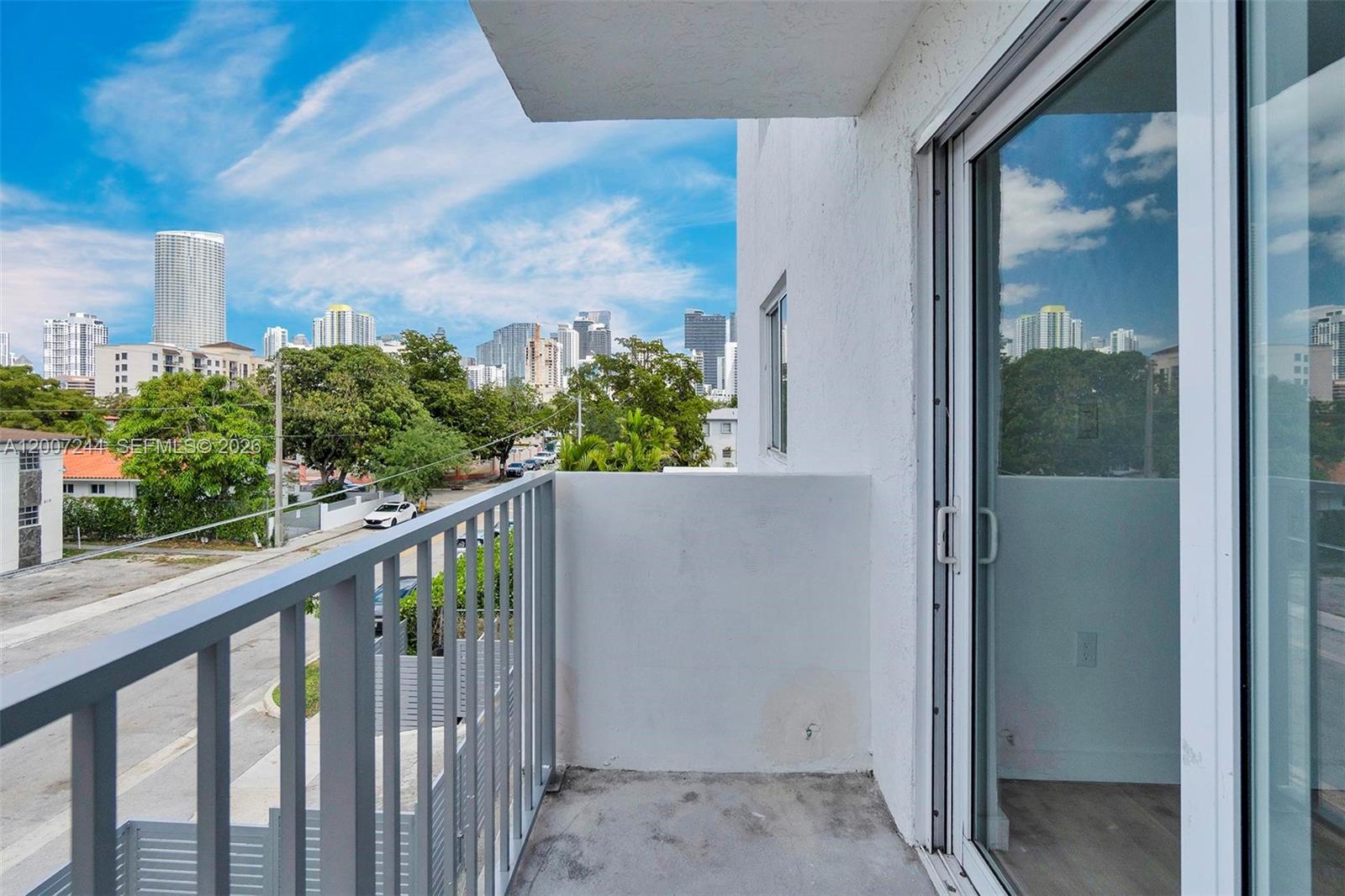 620 Southwest 10th Street, Unit 301 Miami, FL 33130 - Photo 13 of 20 a view of a balcony with flower plants