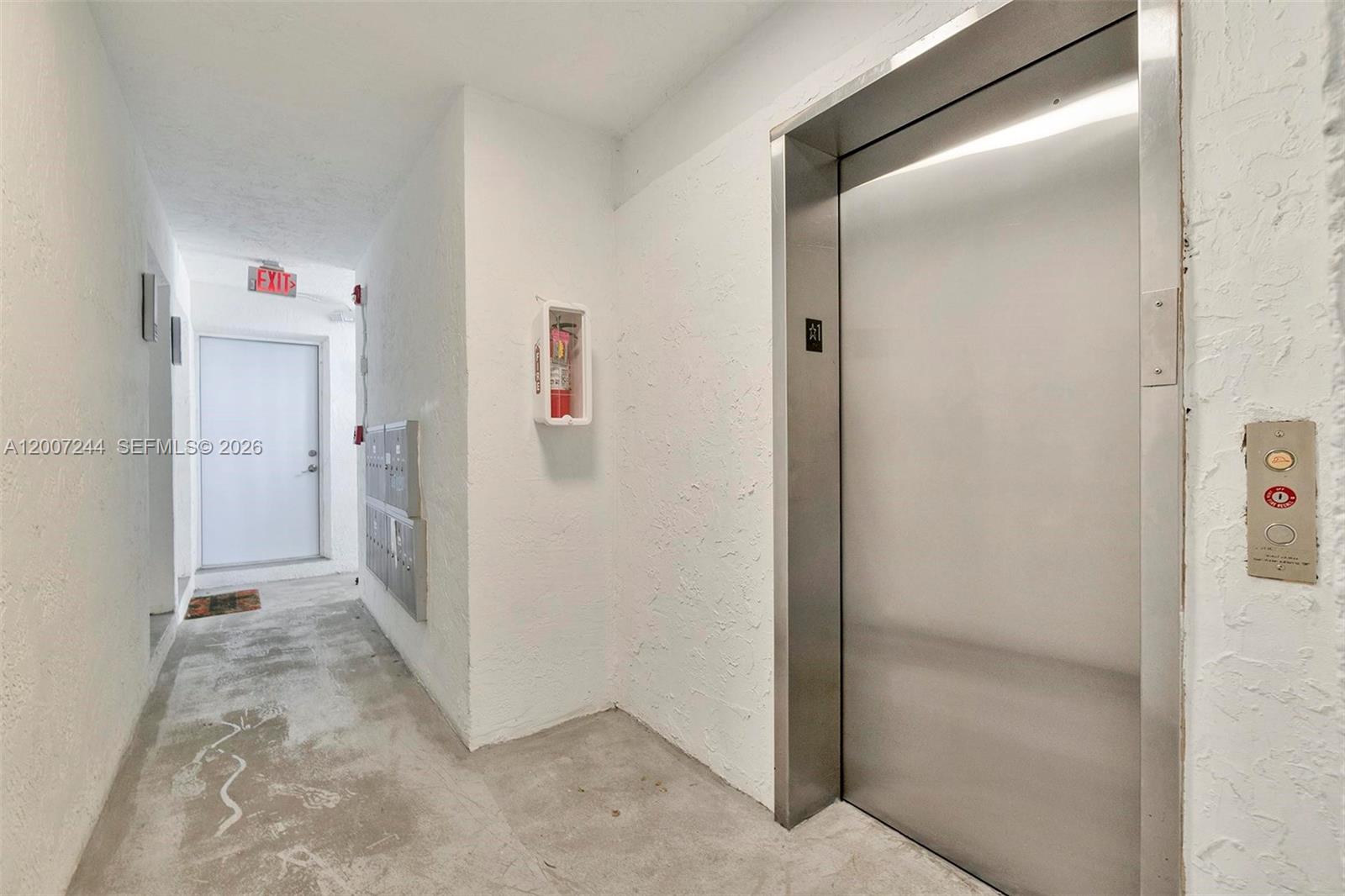 620 Southwest 10th Street, Unit 301 Miami, FL 33130 - Photo 14 of 20 a view of a hallway with closet