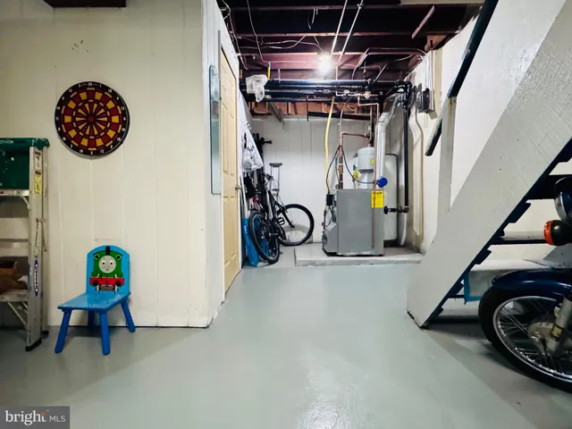 a view of storage and utility room with toys