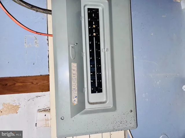 a bathroom with a sink toilet and a mirror