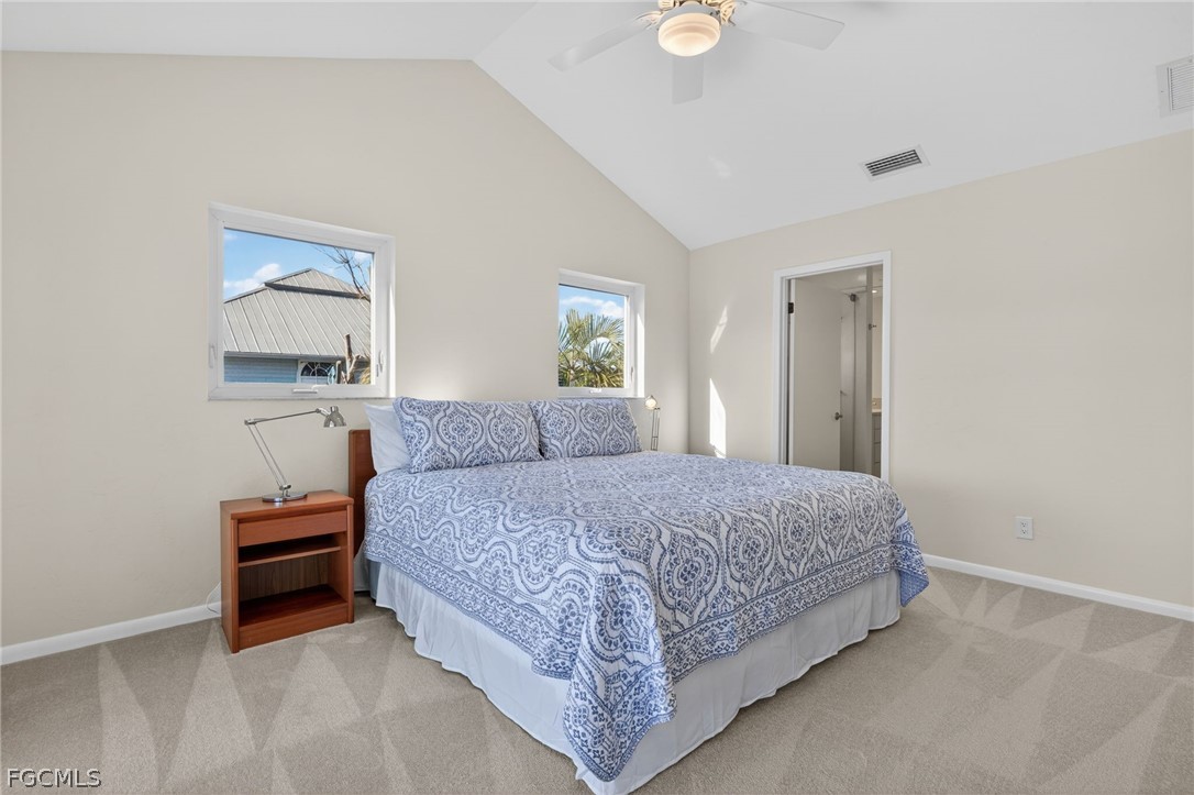 4562 Bowen Bayou Road Sanibel, FL 33957 - Photo 16 of 38 a bedroom with a bed and window