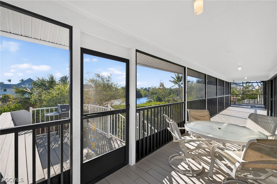 4562 Bowen Bayou Road Sanibel, FL 33957 - Photo 2 of 38 a view of a balcony