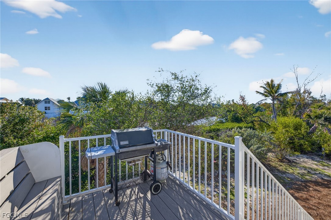 4562 Bowen Bayou Road Sanibel, FL 33957 - Photo 3 of 38 a view of a balcony with furniture