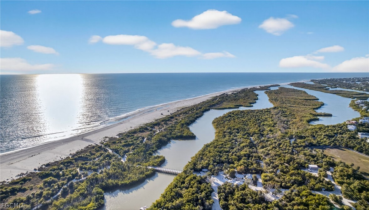 4562 Bowen Bayou Road Sanibel, FL 33957 - Photo 31 of 38 a view of ocean from a balcony