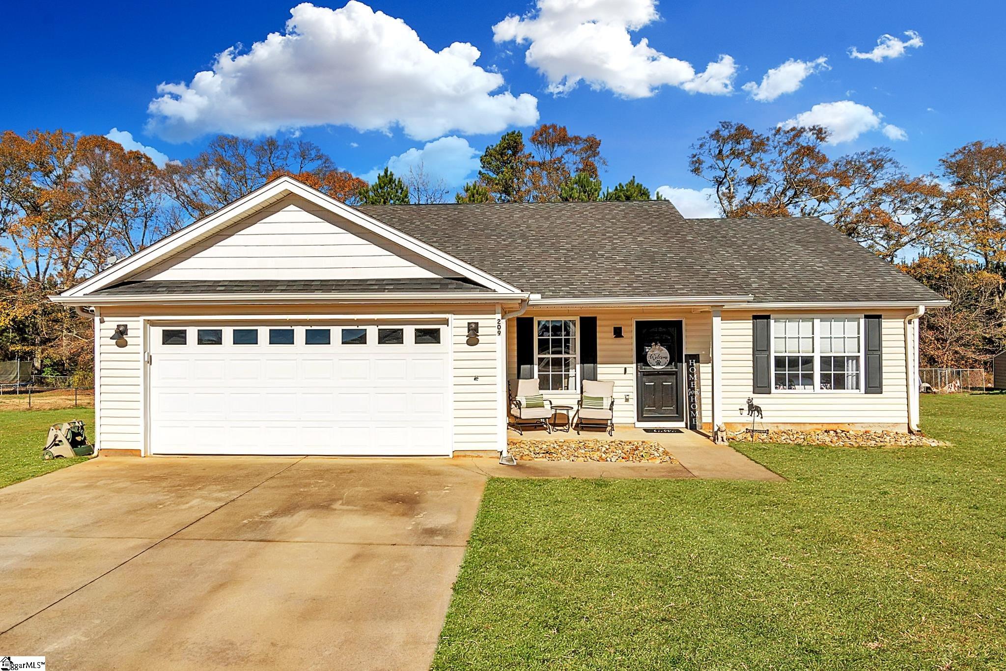 209 Turkey Trot Road Williamston, SC 29697 - Photo 1 of 32 This photo has been enhanced to show you what the lawn could look like in the spring and summer.