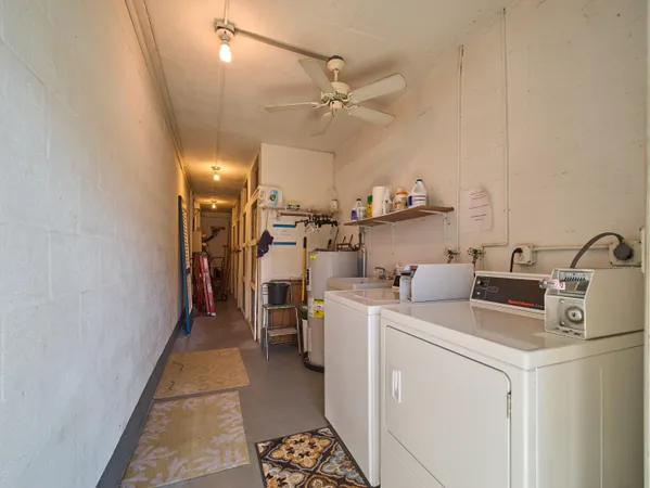 a view of a storage & utility room with washer and dryer