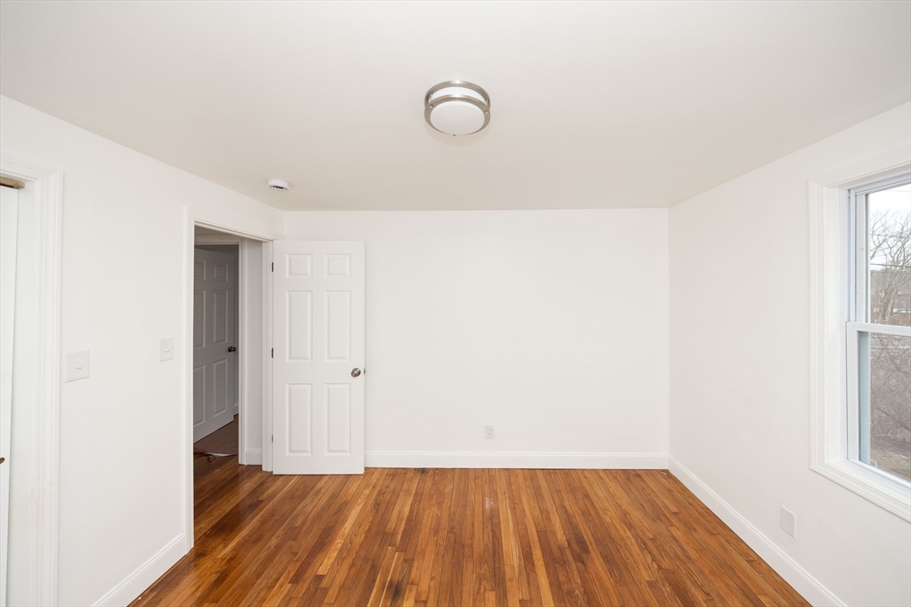 155 Southbridge Road Oxford, MA 01537 - Photo 17 of 39 a view of a room with wooden floor and window