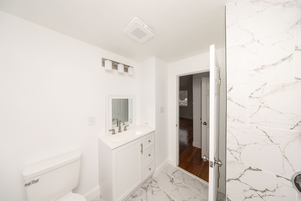 155 Southbridge Road Oxford, MA 01537 - Photo 21 of 39 a bathroom with a sink a toilet and shower