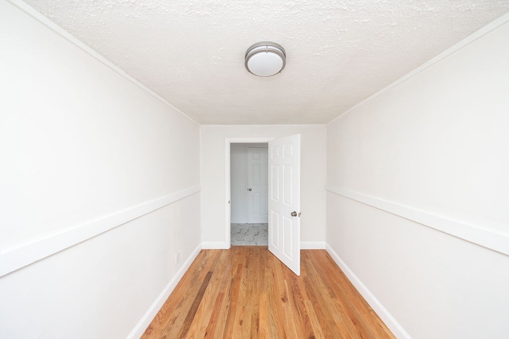 155 Southbridge Road Oxford, MA 01537 - Photo 32 of 39 a view of a room with wooden floor
