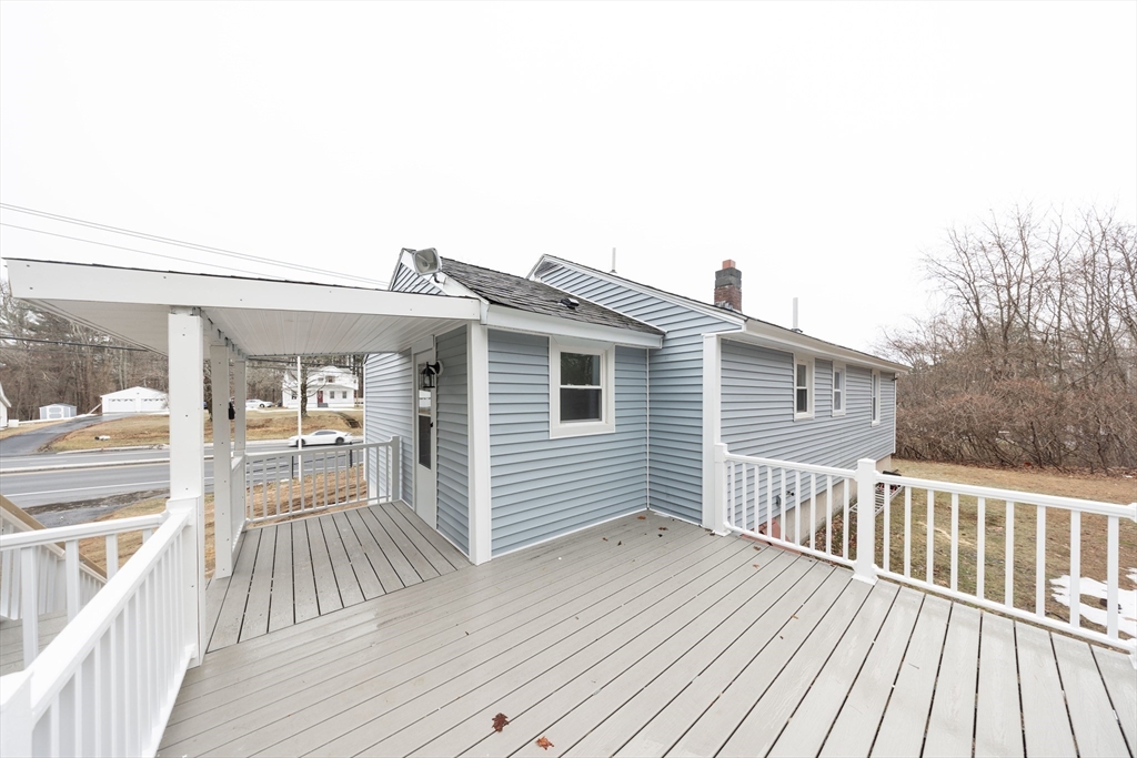 155 Southbridge Road Oxford, MA 01537 - Photo 35 of 39 a view of a house with a deck