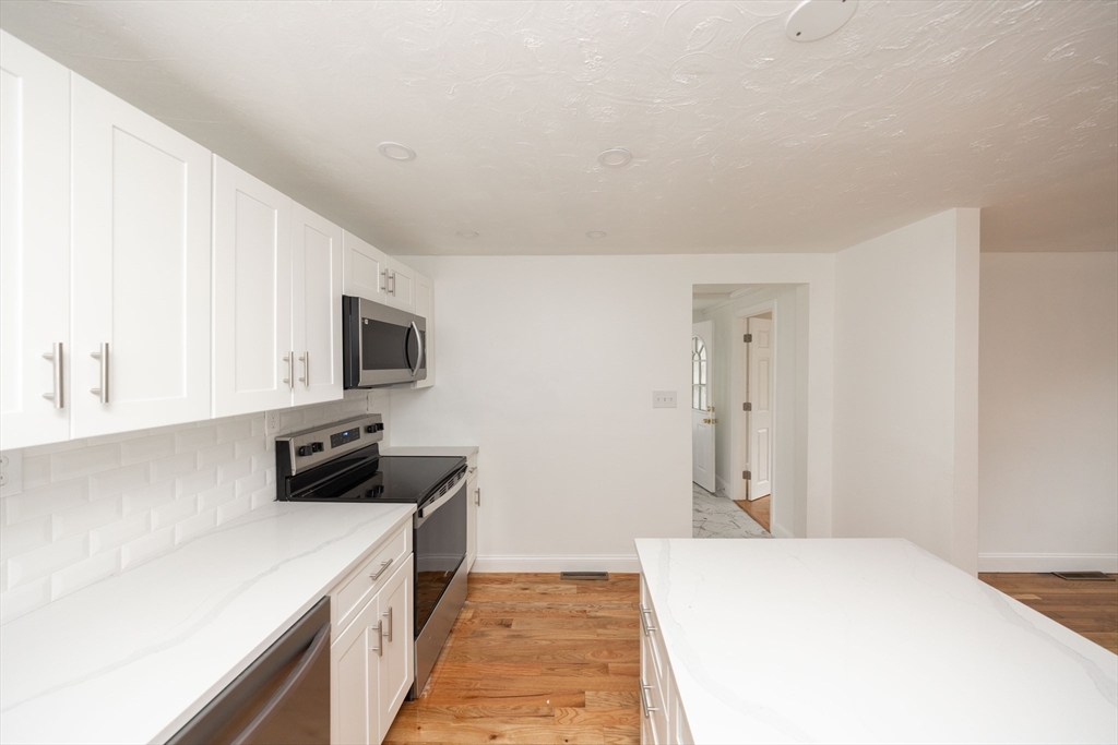 155 Southbridge Road Oxford, MA 01537 - Photo 4 of 39 a kitchen with a stove and a sink