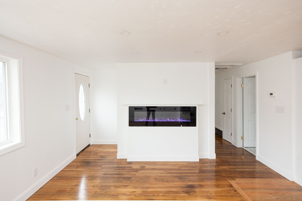 155 Southbridge Road Oxford, MA 01537 - Photo 10 of 39 a view of a livingroom with wooden floor