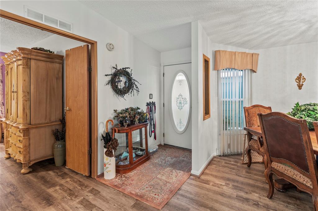 83 Eagle Circle Ellenton, FL 34222 - Photo 9 of 60 a view of room with furniture and wooden floor