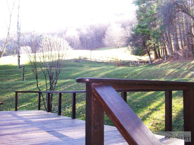987 Cobbs Creek Road Boone, NC 28607 - Photo 26 of 29 a balcony view with a garden and plants