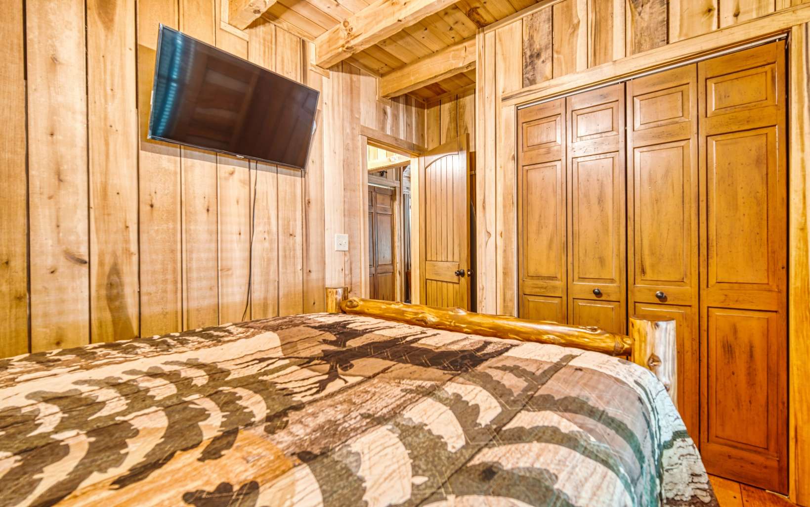 889 Joann Sisson Road Blue Ridge, GA 30513 - Photo 23 of 41 a bedroom with a bed and a window