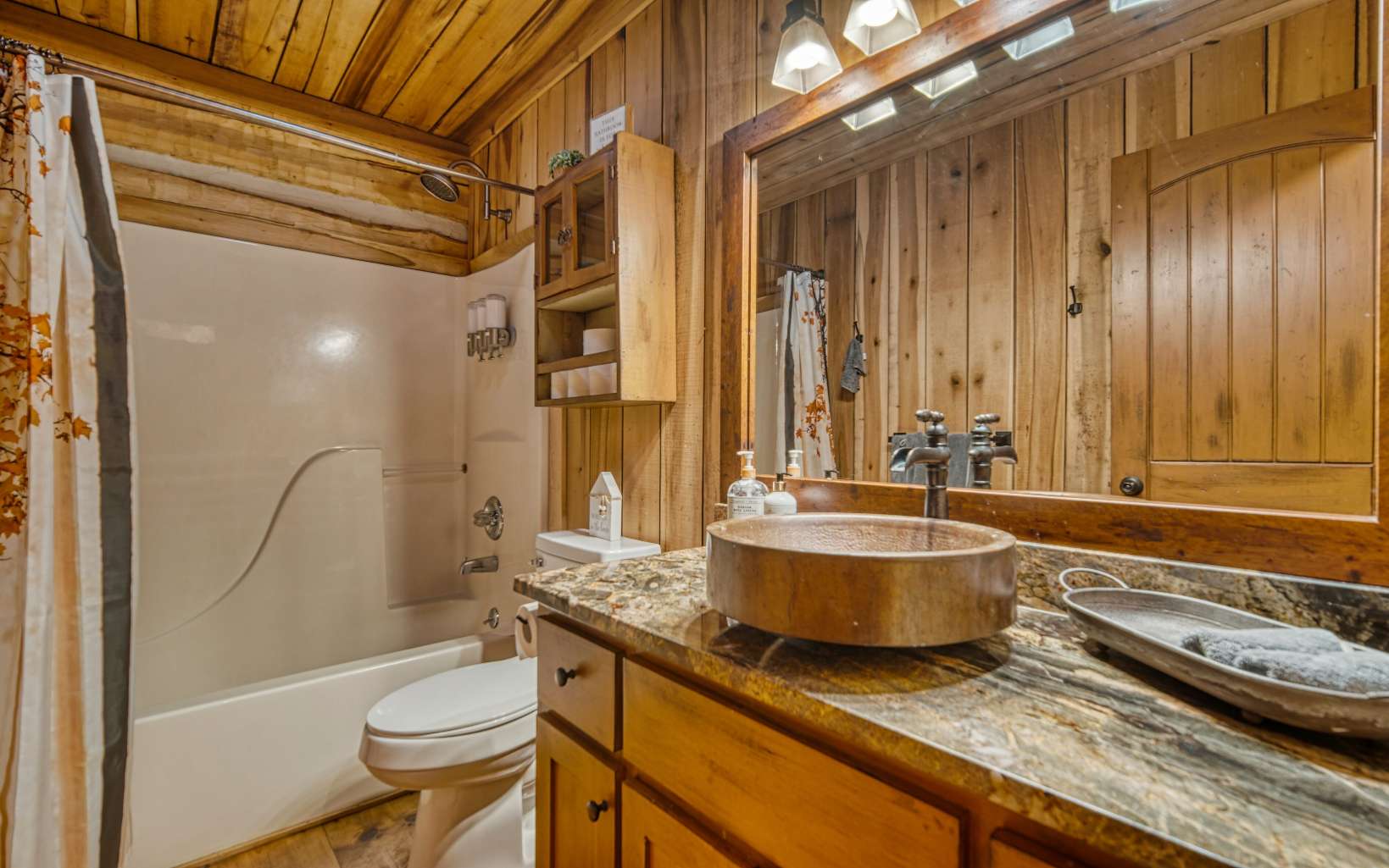 889 Joann Sisson Road Blue Ridge, GA 30513 - Photo 24 of 41 a bathroom with a granite countertop sink and a mirror