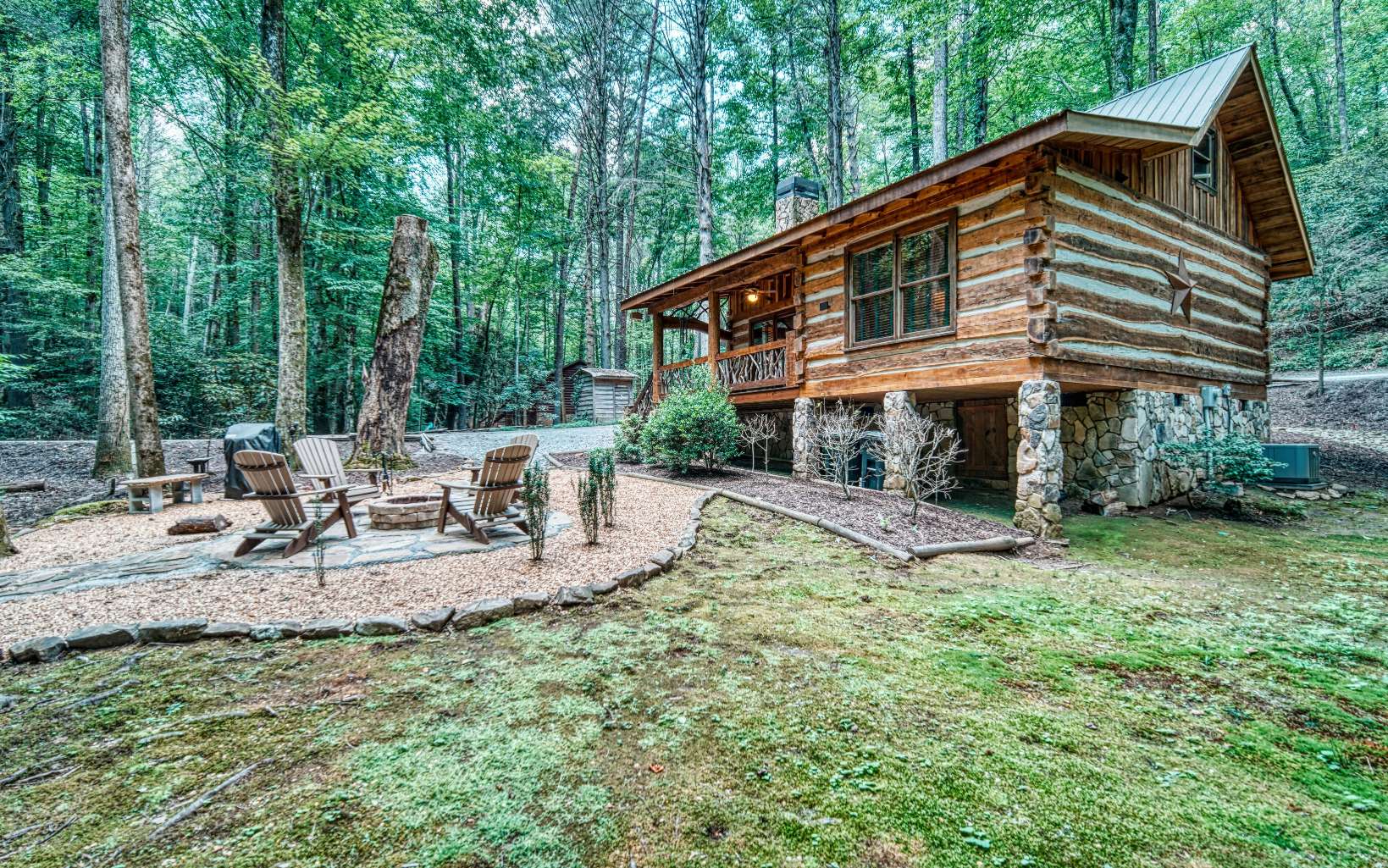 889 Joann Sisson Road Blue Ridge, GA 30513 - Photo 26 of 41 a view of a house with backyard and trees