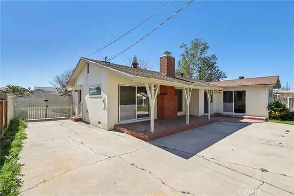 front view of a house with a patio