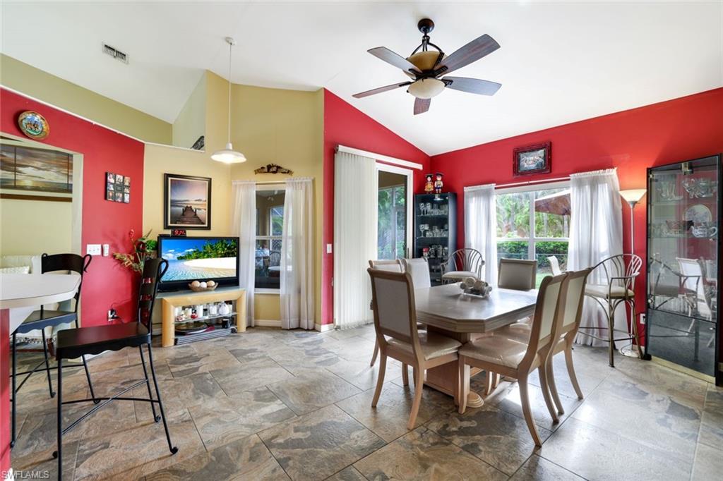 1920 Piccadilly Circus Naples, FL 34112 - Photo 13 of 25 a view of a dining room with furniture window and outside view