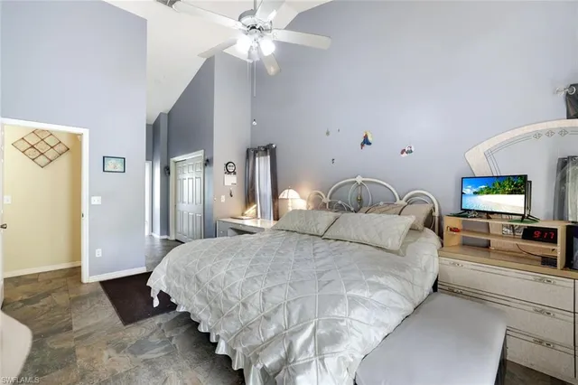 a bathroom with a tub a sink a mirror and a bathtub