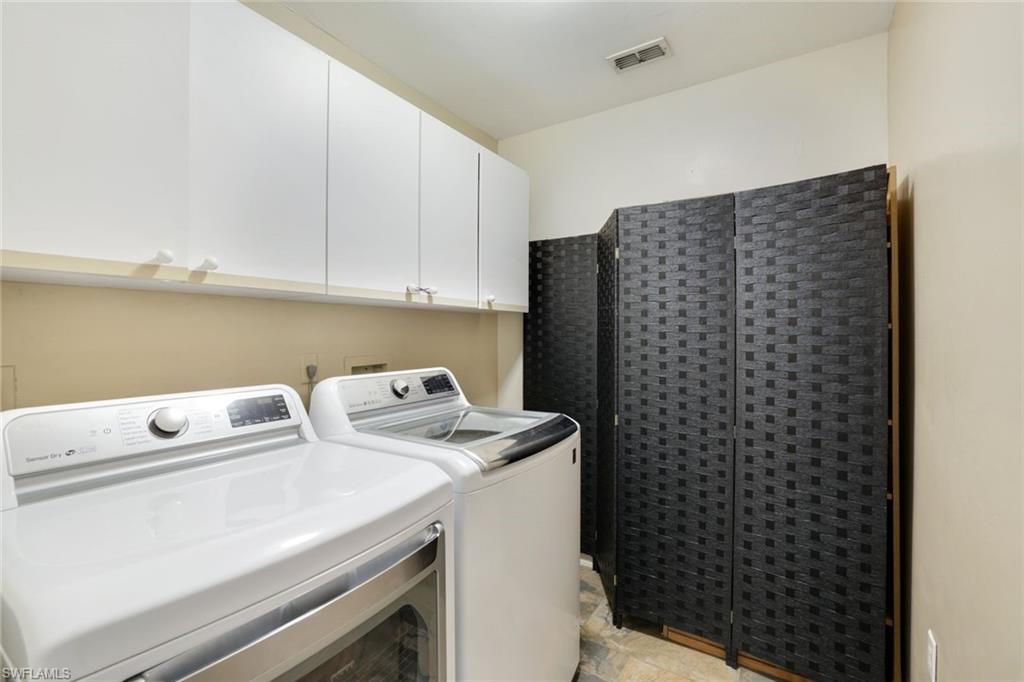 1920 Piccadilly Circus Naples, FL 34112 - Photo 21 of 25 a utility room with dryer and washer
