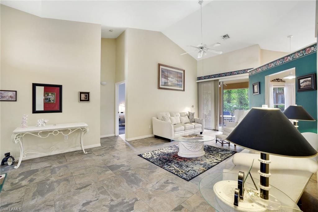1920 Piccadilly Circus Naples, FL 34112 - Photo 7 of 25 a living room with furniture and wooden floor