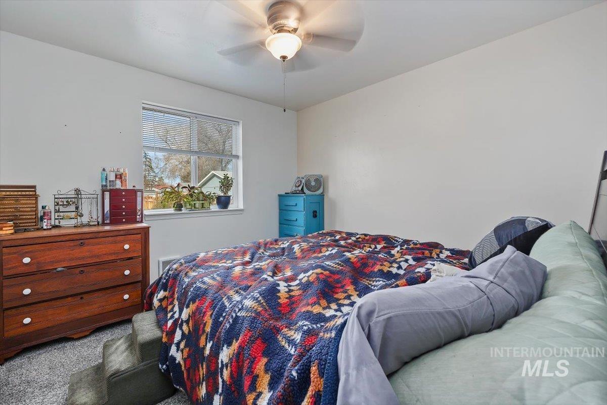 347 Polk Street Twin Falls, ID 83301 - Photo 18 of 25 Carpeted bedroom with ceiling fan