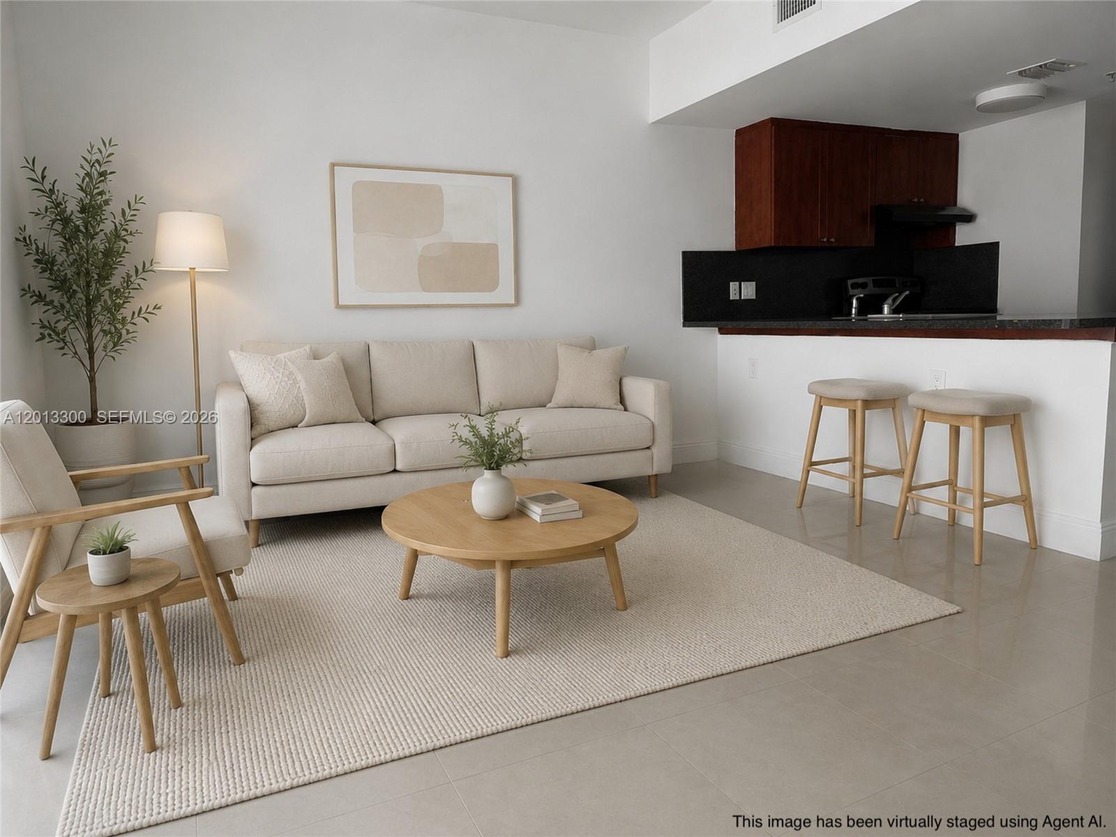 1020 Southwest 4th Street, Unit 102 Miami, FL 33130 - Photo 1 of 14 a living room with furniture and a flat screen tv