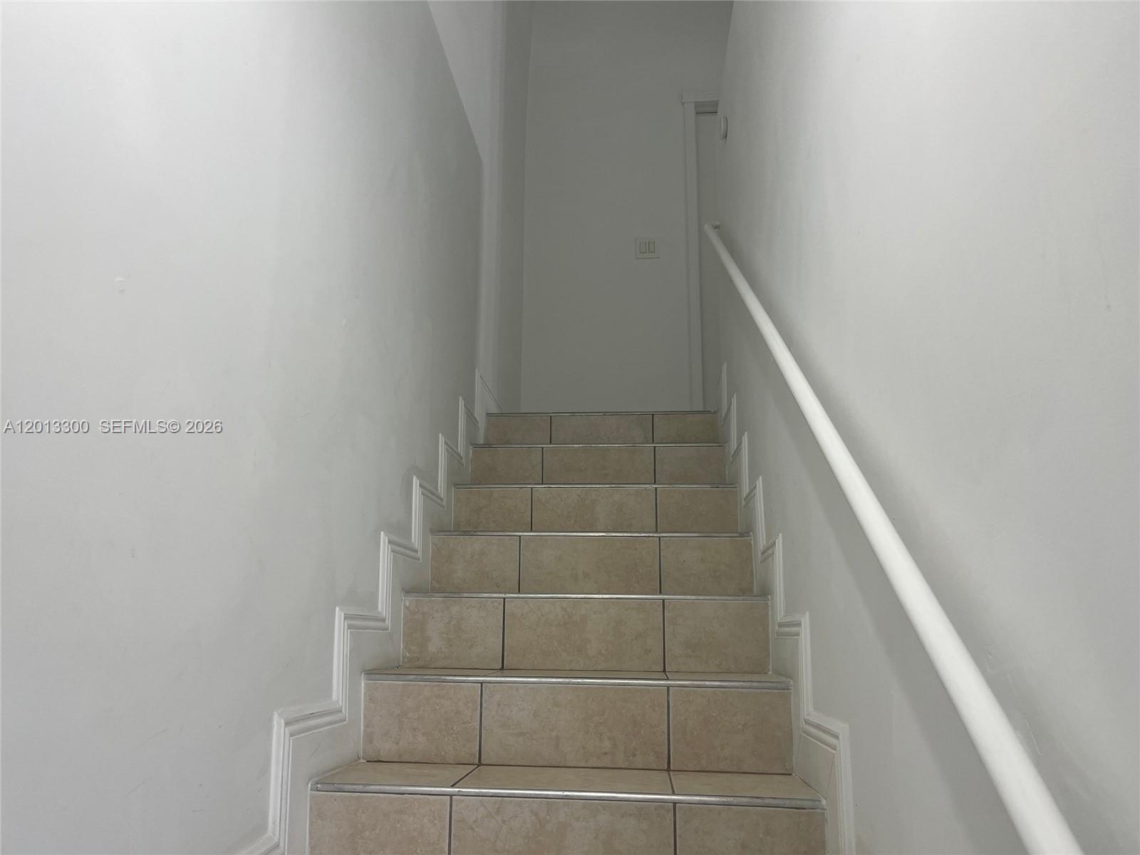 1020 Southwest 4th Street, Unit 102 Miami, FL 33130 - Photo 5 of 14 a bathroom with a white wall