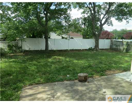 10 James Road East Brunswick, NJ 08816 - Photo 14 of 15 a backyard of a house with lots of green space